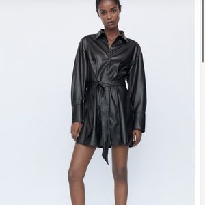 Faux leather dress/ Jacket with belt. could be worn open or closed